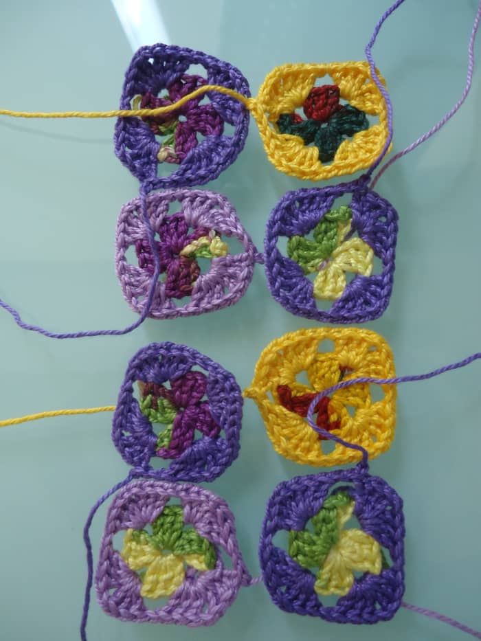 Make sure the tails are going clockwise (or counterclockwise) so you can be sure the squares will all be joined together. If you find yourself lacking thread, you can simply attach a new one and continue sewing.