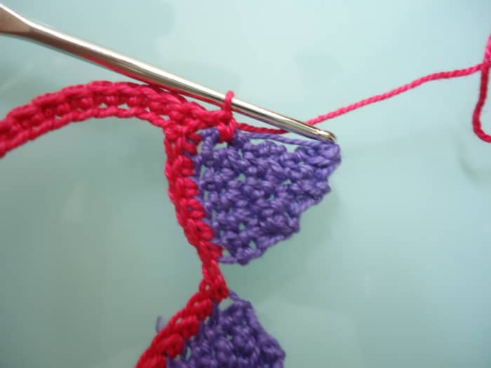 This is the second side of the border. It goes up one side of the triangle up to one tie for the neck.
