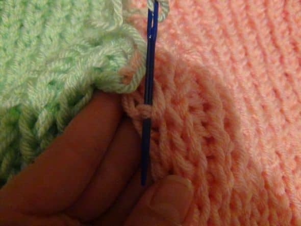 Close-up of the panel stitching. Sew through the post inside the stitch, to create an invisible seam.