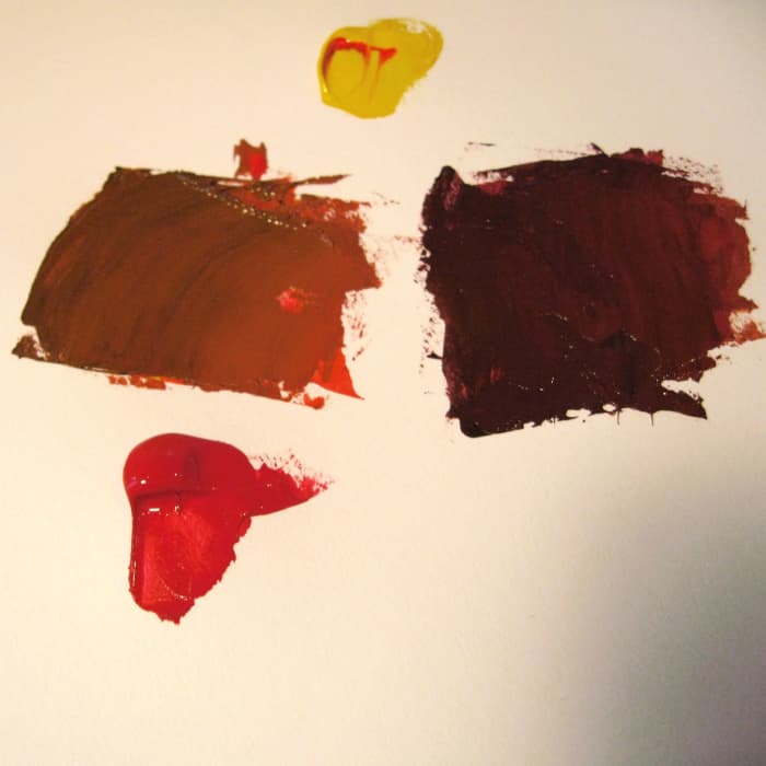 Step 4: I made another orange and added a little more blue this time: I got a dark chocolaty brown.