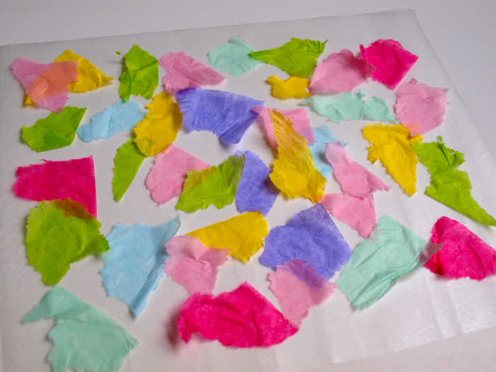 Start applying the tissue paper.