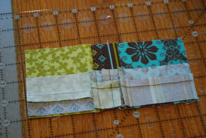 Always lay the small piece over the large piece to line up fabrics (I exaggerated the edge in the picture so it would be clearer to see).