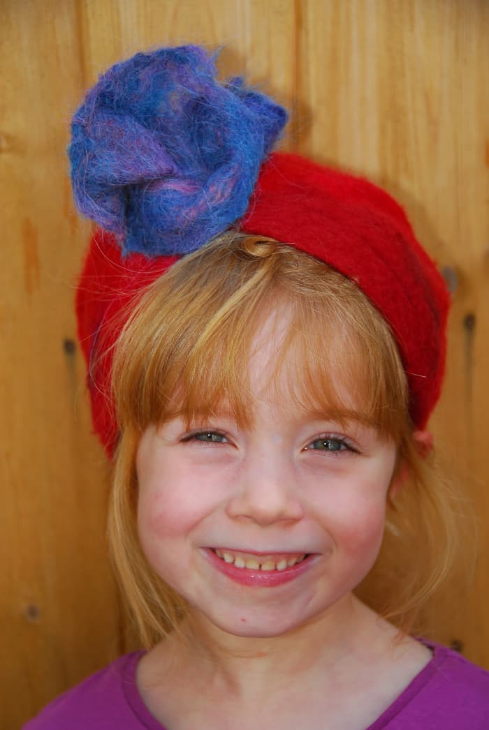 The hat could be shaped to have a brim by turning over the ends. Add a flower, see top video or check my other tutorials.