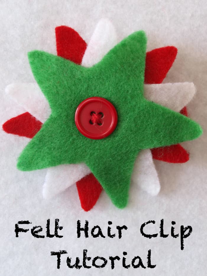 Christmas colors and a star cookie cutter template made this festive hair clip. The button serves as a decoration as well as the mechanism for attaching the design to the clip.