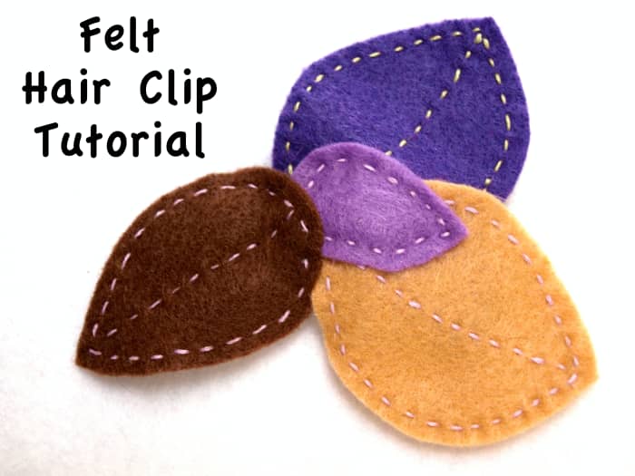 Free form leaf shapes in subtle colors give this barrette an autumn flavor. No template was used when cutting the shapes and the running stitch anchors the leaves to the clip.