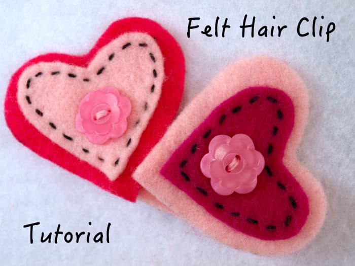 Valentine's Day hearts are a great design for a barrette. Buttons and the running stitch were used to help anchor the hearts to the clip.