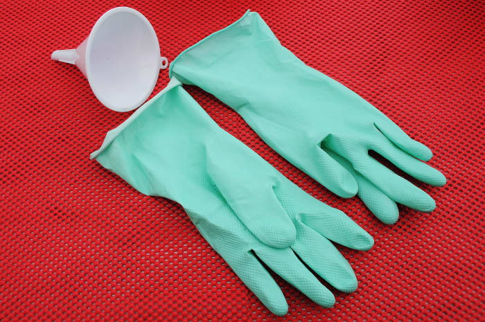 A pair of latex household gloves and a plastic Funnel, the latter is only useful if the polystyrene balls are able to fit through the entrance without becoming blocked.