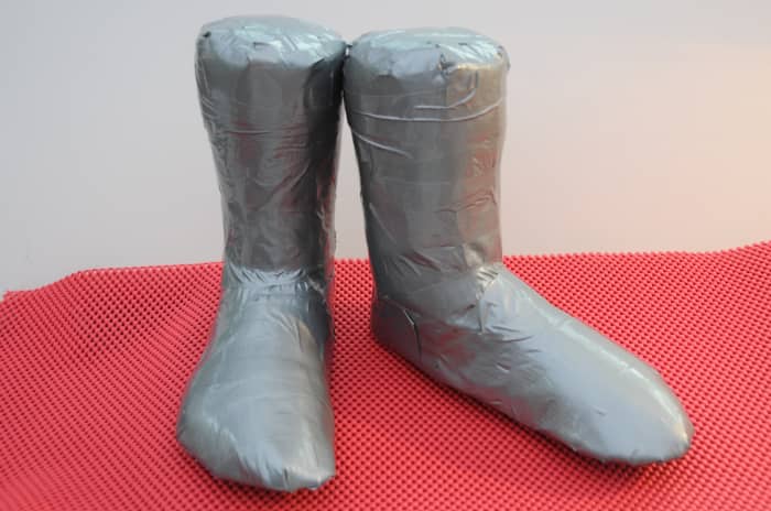 These duct tape shoe lasts were custom made. The wearer has one foot larger than the other.