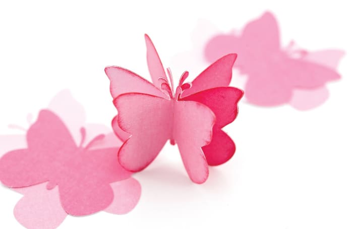 Even simple little punched butterflies can be layered up in an interesting way to make pretty decorations like these.