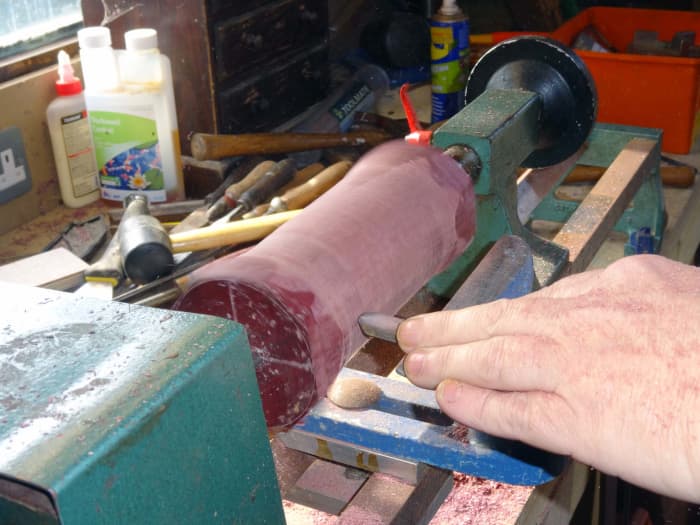 I used the lathe to make the handle from Purpleheart wood with insert for Maine Coon Cat motif coin.
