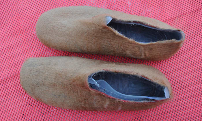 Four layers have now been completed. The slipper is inside out. The stuffing has been removed and the Aqua shoes are almost ready to be extracted.