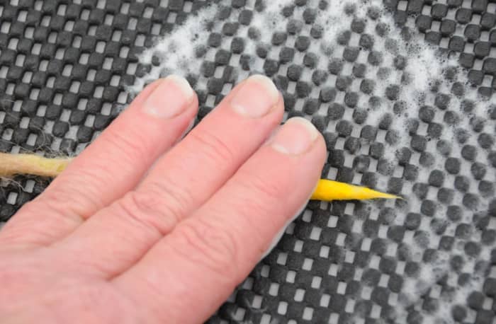 Roll well until fully felted. You may wish to add two layers to the yellow section to make it more defined.