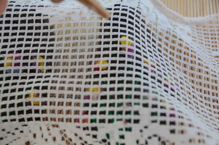 Cover with curtain netting, wet and rub well with fingers or using a piece of folded bubble wrap. Keep on checking the placement of the fibers to make sure none have moved.