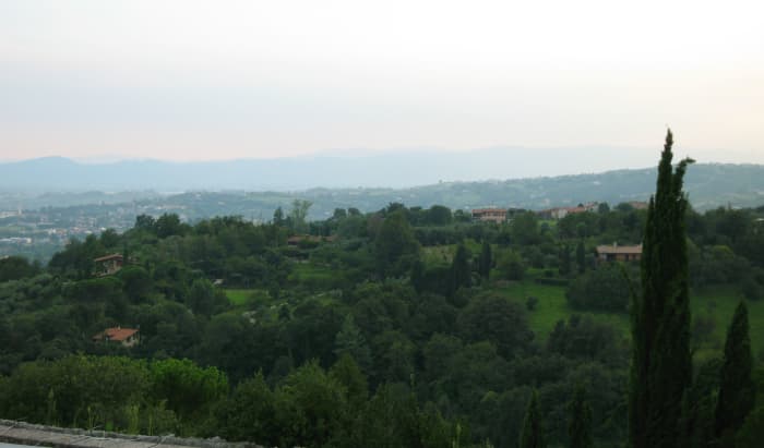 Here the effect of atmospheric perspective on the trees and hills farther away is clearly visible. View in Marostica, Italy.