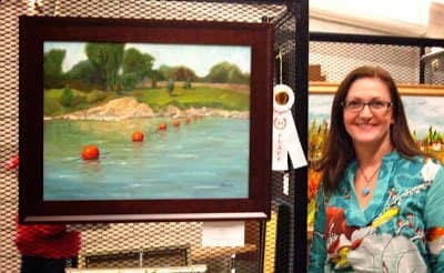 Me and one of my landscape paintings. Here I simplified quite a bit. There was a building in the background, the fence was intricate, and the trees were distributed differently.