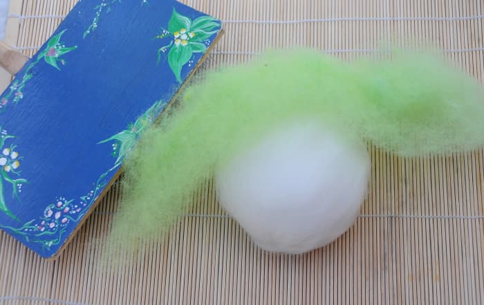 I blended the wool, using a wool carder - not required as you can use already prepared colors.