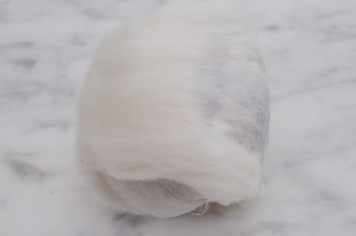 Dip the joined edge in warm soapy water. Pat the joined edge on a waterproof surface - in this case a marble tabletop.