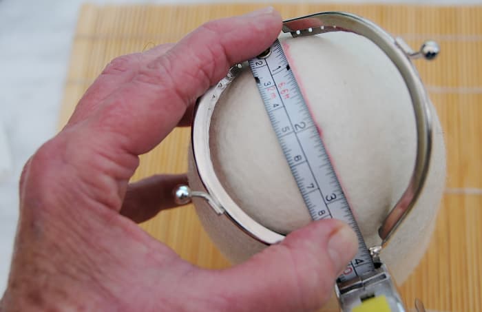 Measure the opening for the Coin Purse. It should measure approximately 4 cm across the frame.