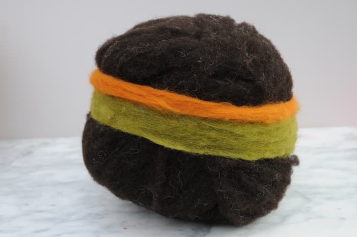 Wrapping a few stripes around the Gertie ball to add a little color to the shoulder bag.