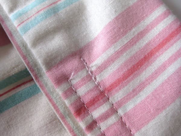 An example showing the forward/reverse stitching near the opening (where the vertical pins were).