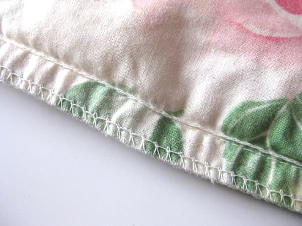 Luckily, my pillowcase had strong stitching already in place, but if yours doesn't, sew a running stitch and an overlocking stitch on all raw edges.