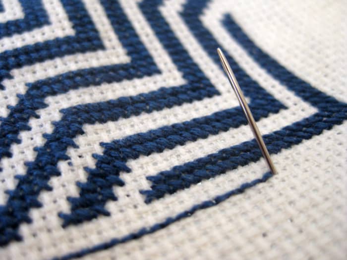 Step D: Bring the needle up at the end of the stitching and start at the beginning of the backstitching method.