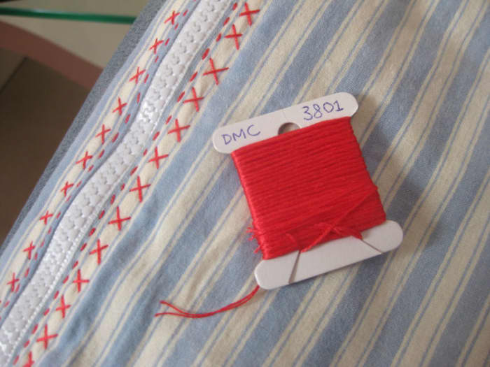 DMC embroidery thread. Usually it comes as a skein, instead of wrapped on a card like this. You can wrap it if you want to - up to you!