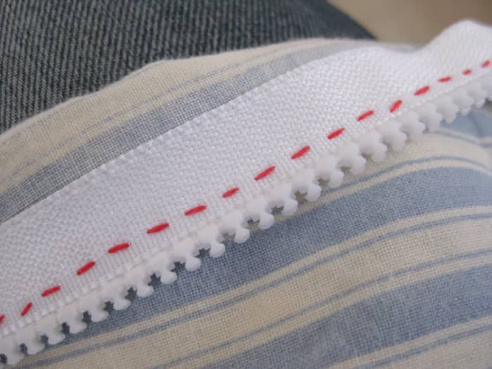 What the back looks like. The zipper should be stitched with running stitch onto the pillow case.