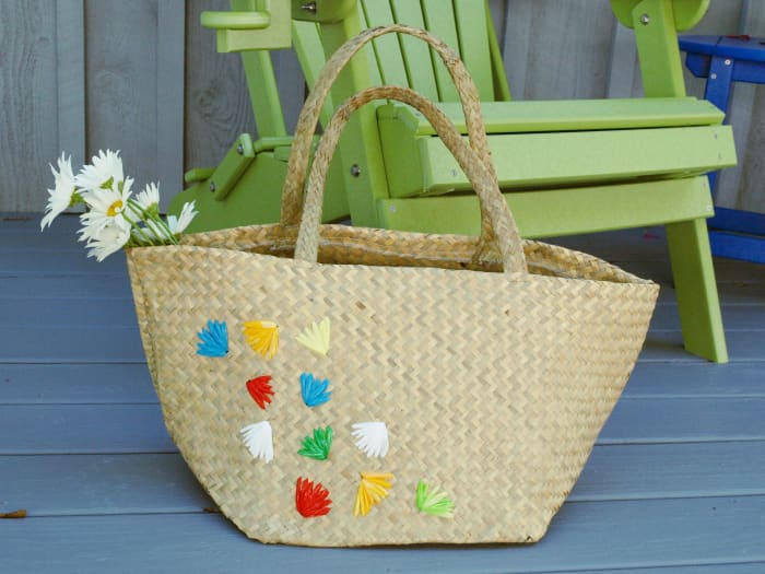 Straw Bag Embellished with Flowers Made From Recycled Plastic Bags - A cute retro look for a new bag!
