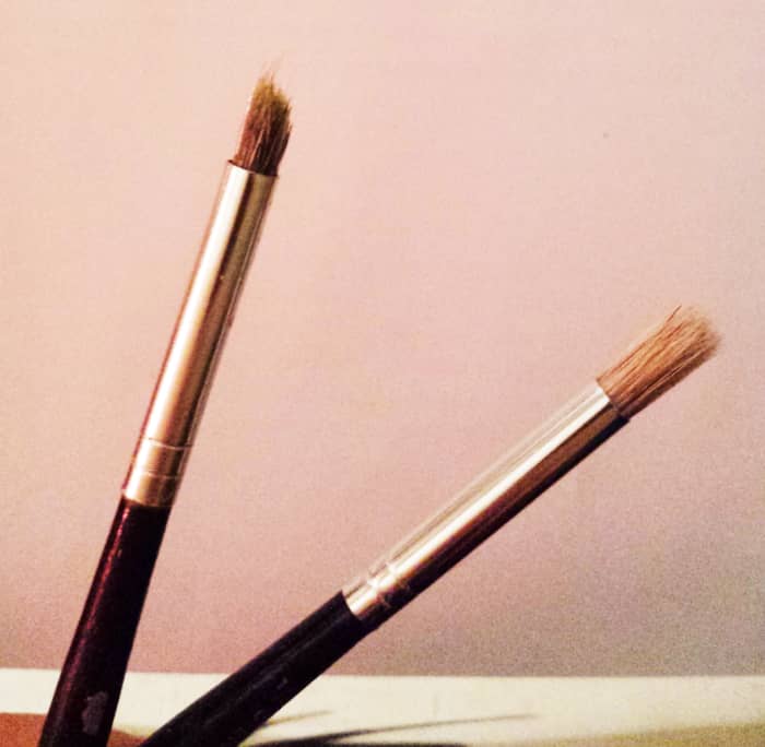 The brush on the left is my favorite brush for applying layers of paint. It gives a nice blend. It looked like the one on the right, brand new. If my fave brush goes kaput, I'll have to wait for the one on the right to become like it. Or find one.