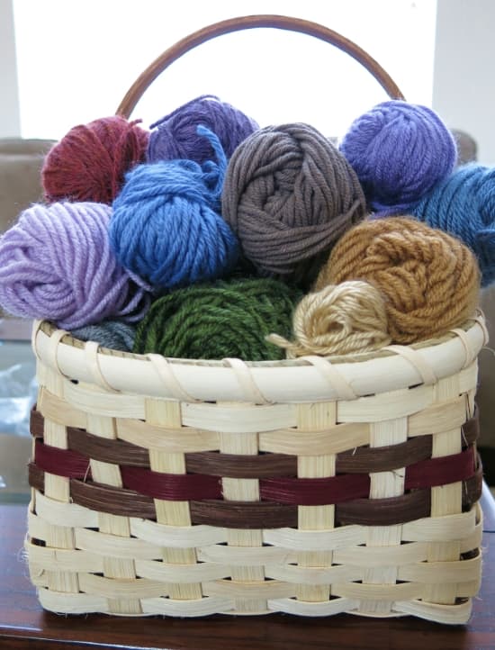 The Confetti Fringe Pillow Cover and the matching Cup Cozy pattern are both great stash busting projects.