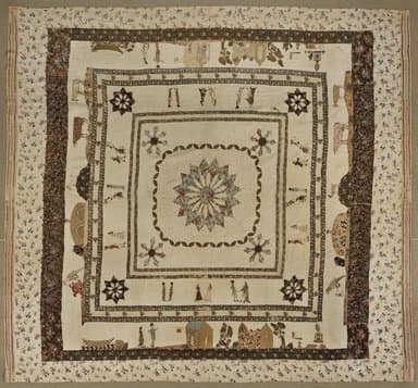 This quilt tells a story of the people shown on it.