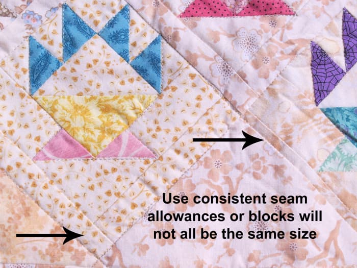 Not one of these basket pattern blocks ended up being the same size, so I had to add strips to make all of the squares even. You can see how bad the blocks were by the strip sizes.