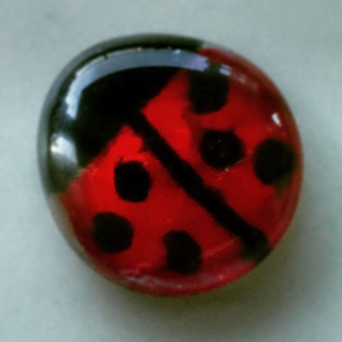 This is the finished ladybug. The black ink smeared a bit when I applied the red nail polish, but I like the watery effect it gives the ladybug.