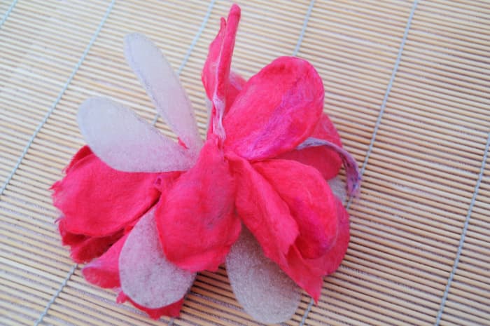 Cut through all of the petal layers, expose the templates and remove leaving the petals behind.