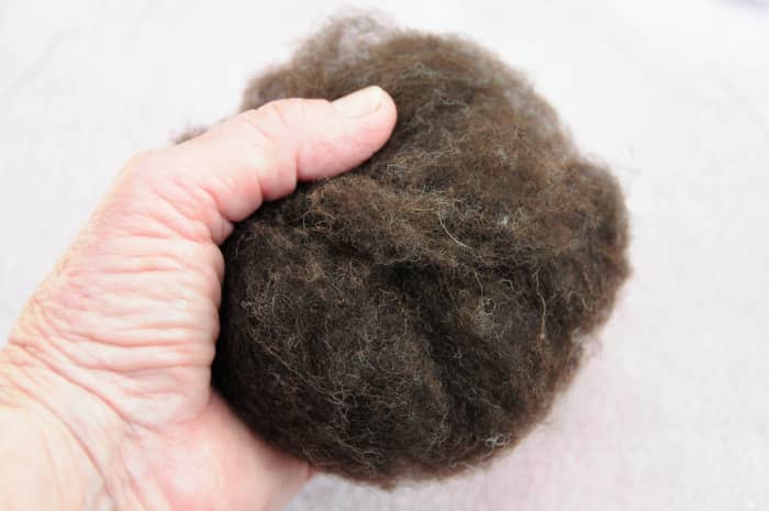 The merino wool oddments covered with a layer of Jacobs fleece. Wet with soapy water and roll gently on a towel covered flat surface until smooth.