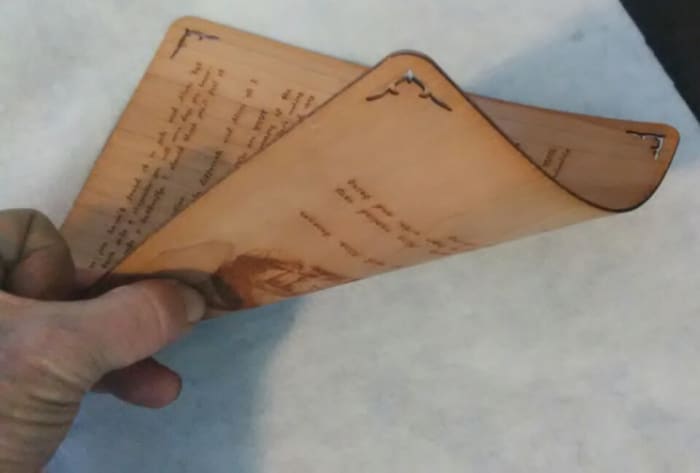 Bending of each individual page was made possible using micro veneer with all the grain going in the same direction.