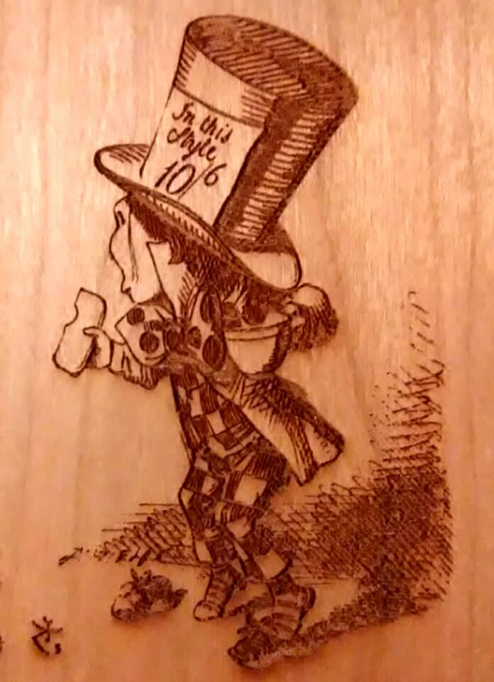 The wood cut style engravings by Sir John Tenniel laser beautifully on Cherry wood.