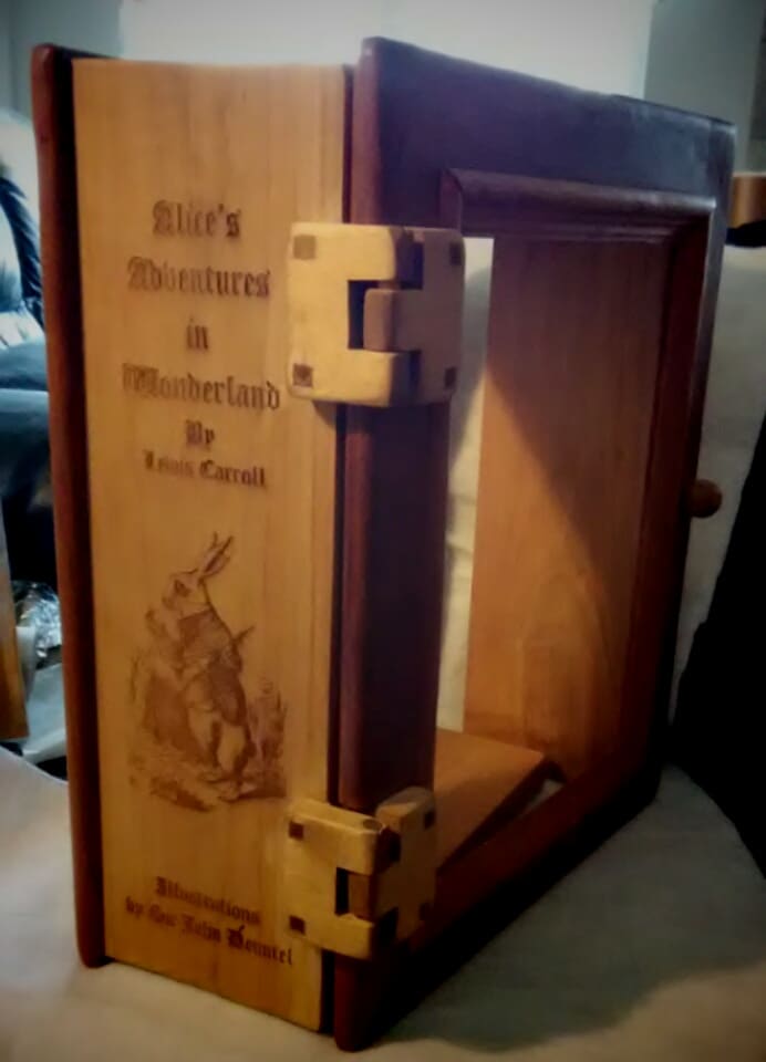 I also used my laser to add engravings to the solid wood storage case for the Alice pages