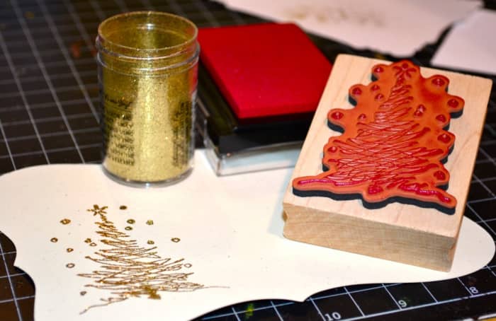 You can use any stamp and some glitter to create a one of a kind art piece