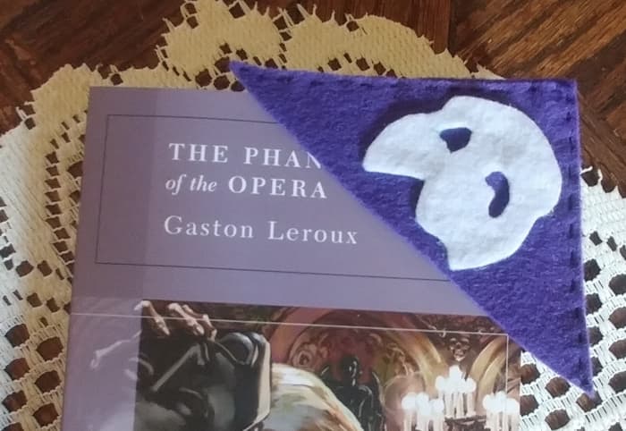 This is a flashy shaped bookmark to keep as an addition to a book collection. I made this one purple, but it can be black or any color of your preference.
