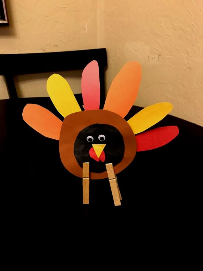 This old-fashioned turkey has wooden legs! Paint the legs whatever color you wish to use.