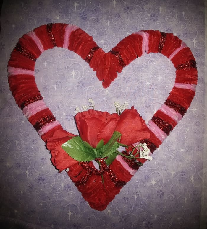 The last touch is to add roses! You may tie the roses to the wreath with another fuzzy stick. I simply stuck the stems through the wreath.