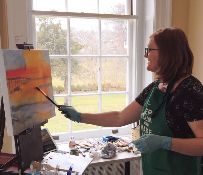 Me loosely starting a painting while giving a demo during an art gallery exhibit—talk about being bold and courageous!