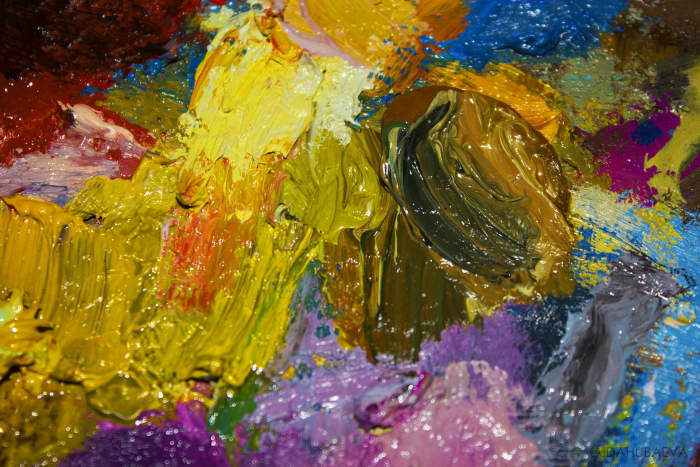 Mixing color on the palette and applying it with unusual tools can create very interesting textures and edges.