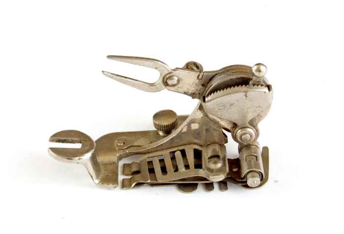 Another vintage sewing machine attachment. Stacking the images brought out amazing detail. Helicon Focus.