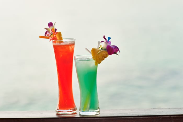 Simple fill flash with manual settings. Without flash the drinks would be dark or the background would be very bright.