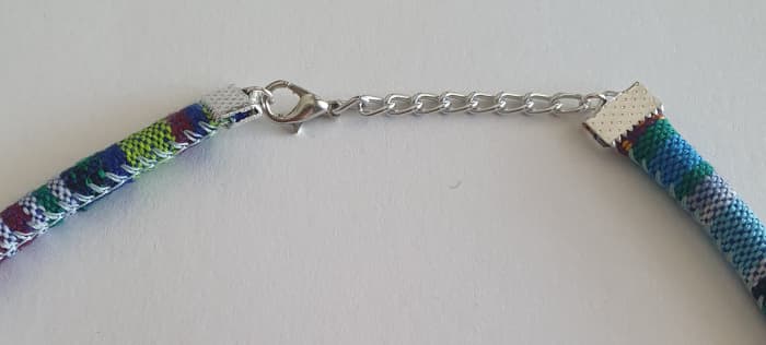 This is one way you can finish your polymer clay necklace. I like to use a chain so i can adjust the length later if necessary.