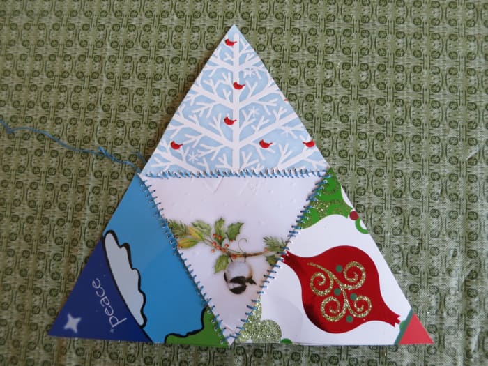 Making a pyramid Christmas ornament from greeting cards is easier than you think!