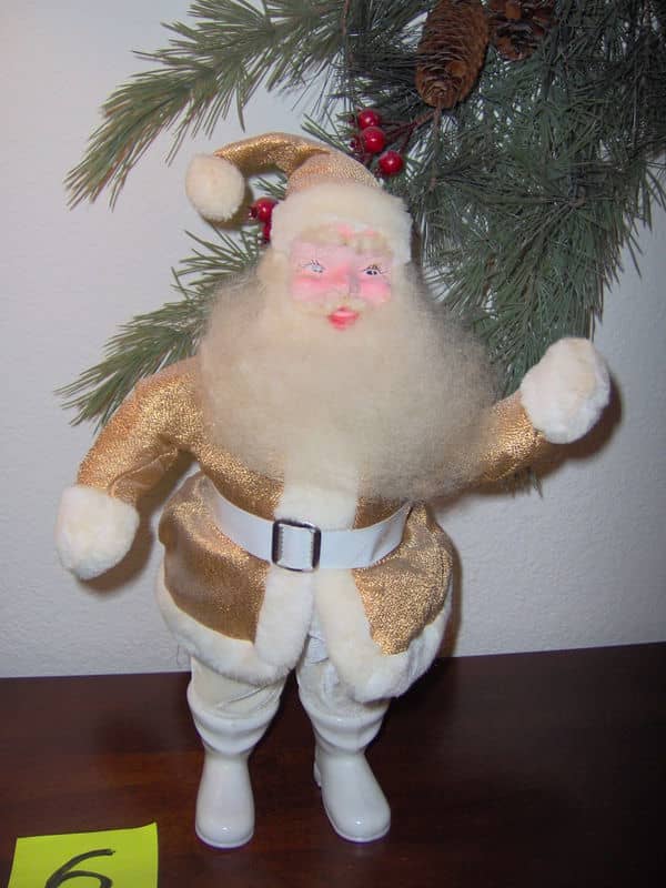 These remarkable well-made Santa’s came in red, gold, green, white, and pink Santa suits and were very well made.